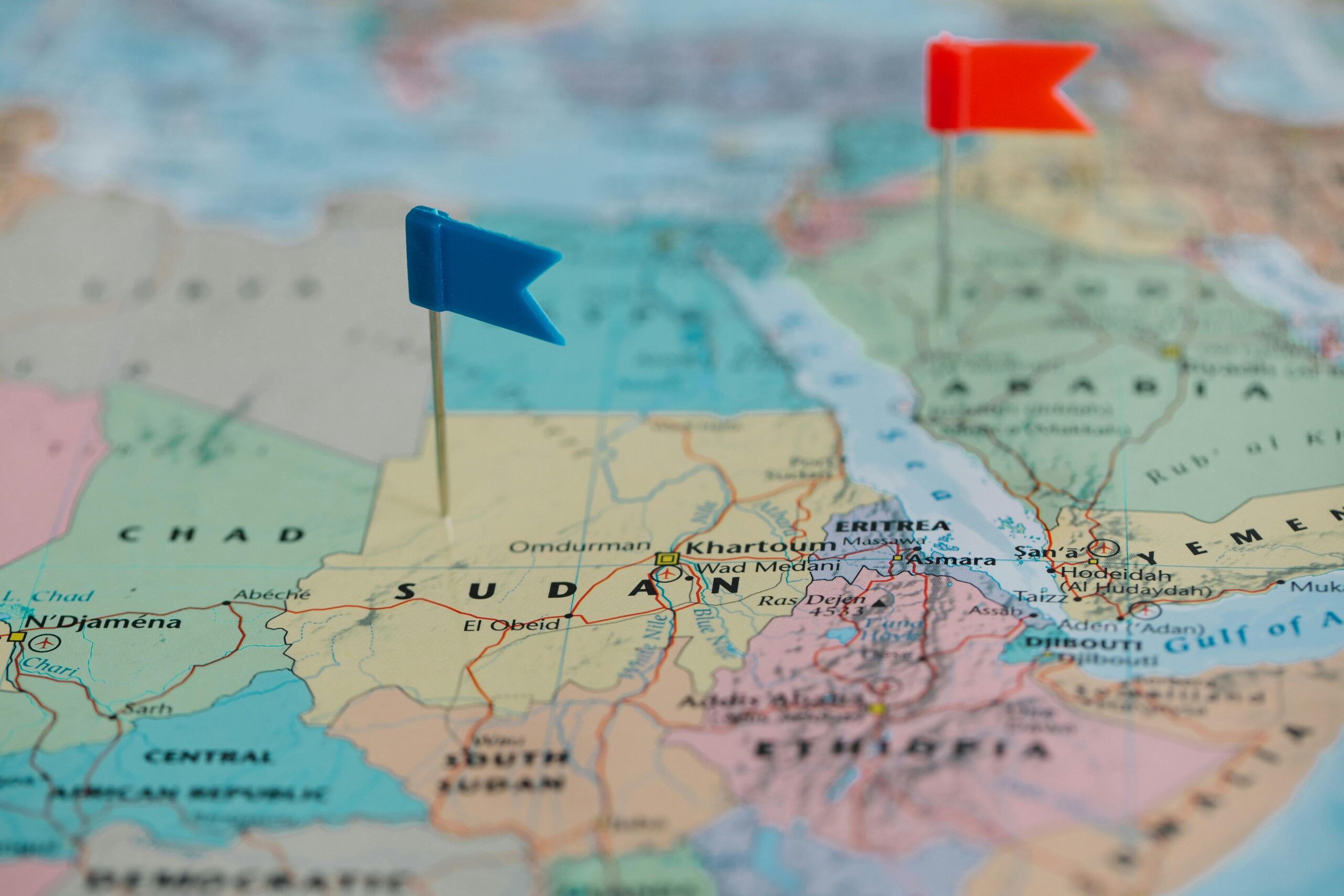 Detailed close-up map of Africa featuring Sudan and nearby countries marked with flags.